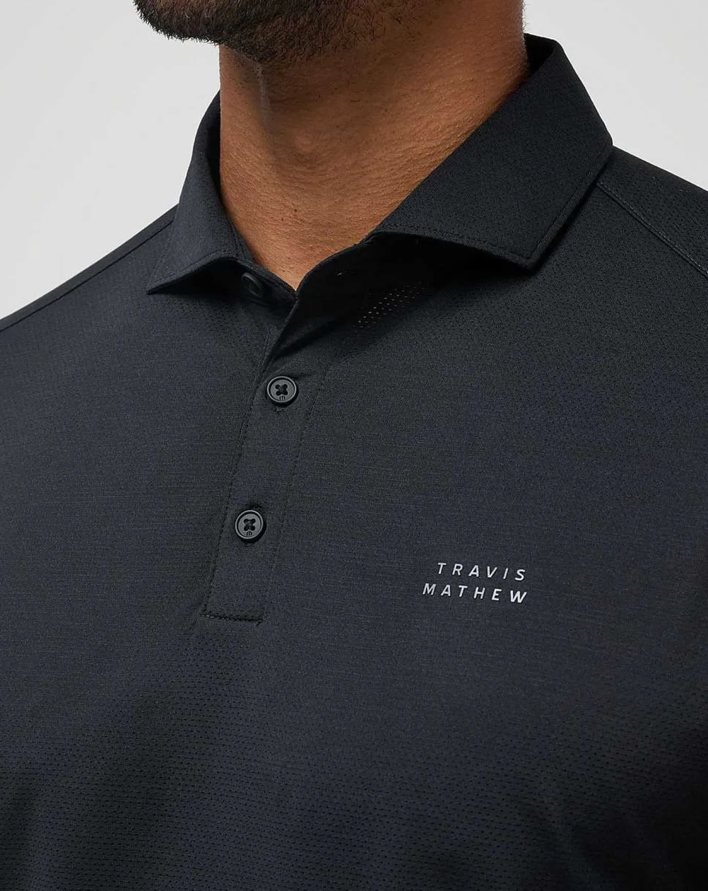 TravisMathew Heater Pro Polo> Polos